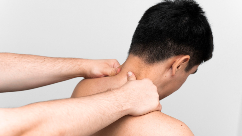 Patient receiving a neck adjustment during a session